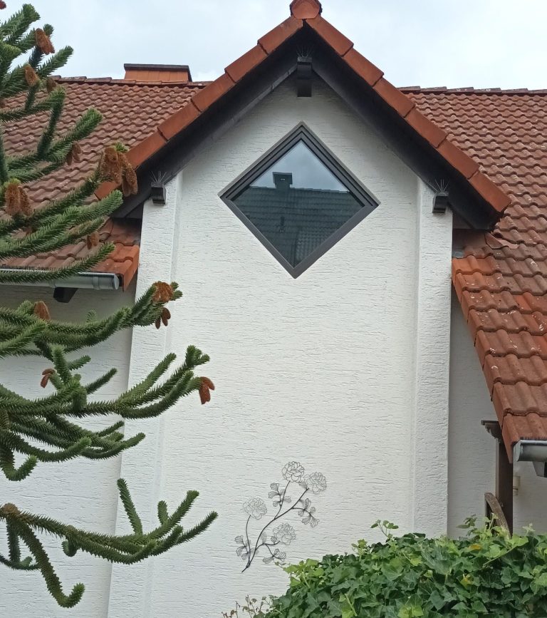 Terrassentür aus Glas mit Holzrahmen