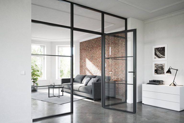 Moderne Wohnraum mit Stahl-Lofttüren als Raumtrenner, Ziegelsteinakzenten und stilvoller Möbelanordnung.